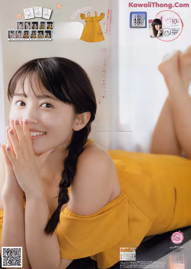 A woman in a yellow dress laying on a bed.