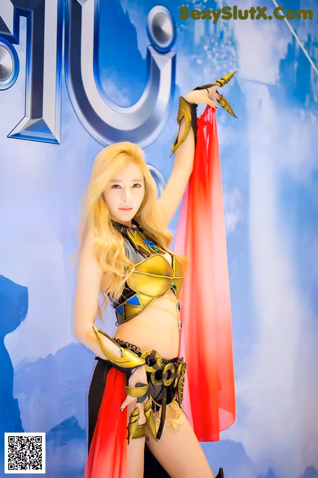 A woman dressed in a costume holding a sword.